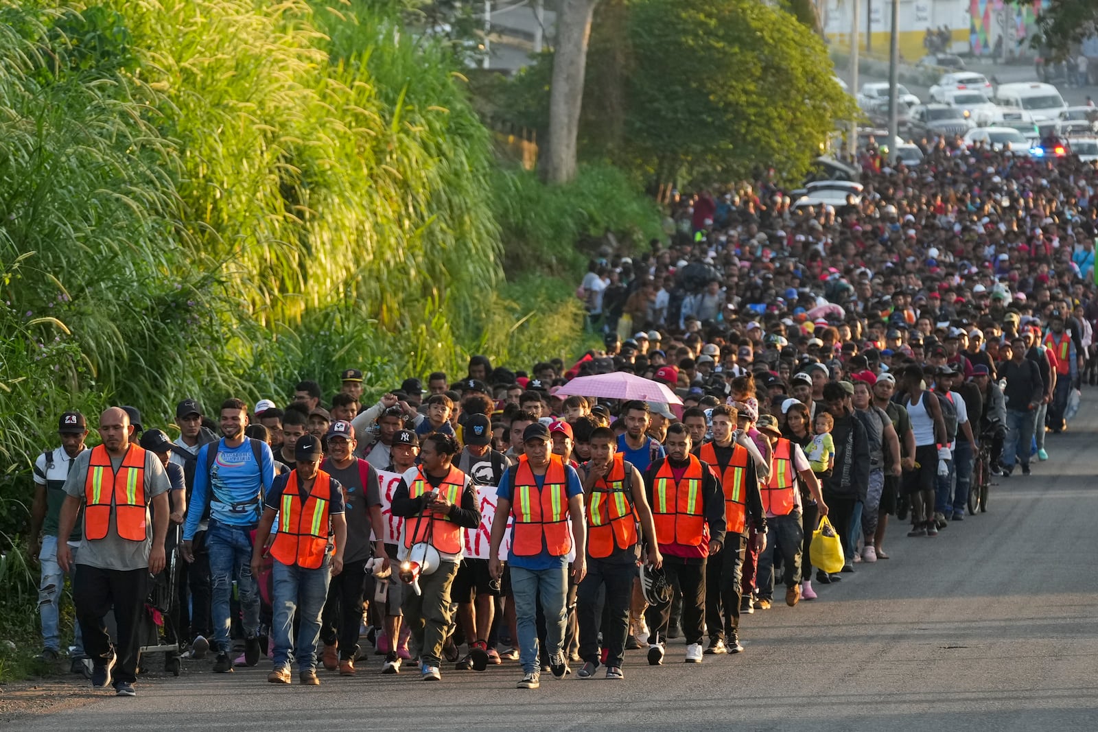 Migrants depart Tapachula, Mexico, in hopes of reaching the country's northern border and ultimately the United States, Tuesday, Nov. 5, 2024. (AP Photo/Moises Castillo)