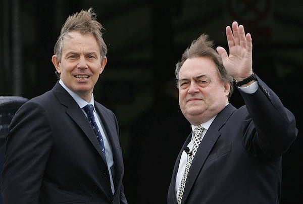 FILE -Britain's Prime Minister Tony Blair, left, turns towards the media with his Deputy John Prescott, on the pier at Gravesend in Kent, England during a visit to promote urban regeneration,March 31, 2005. (AP Photo/Alastair Grant, Pool, File)