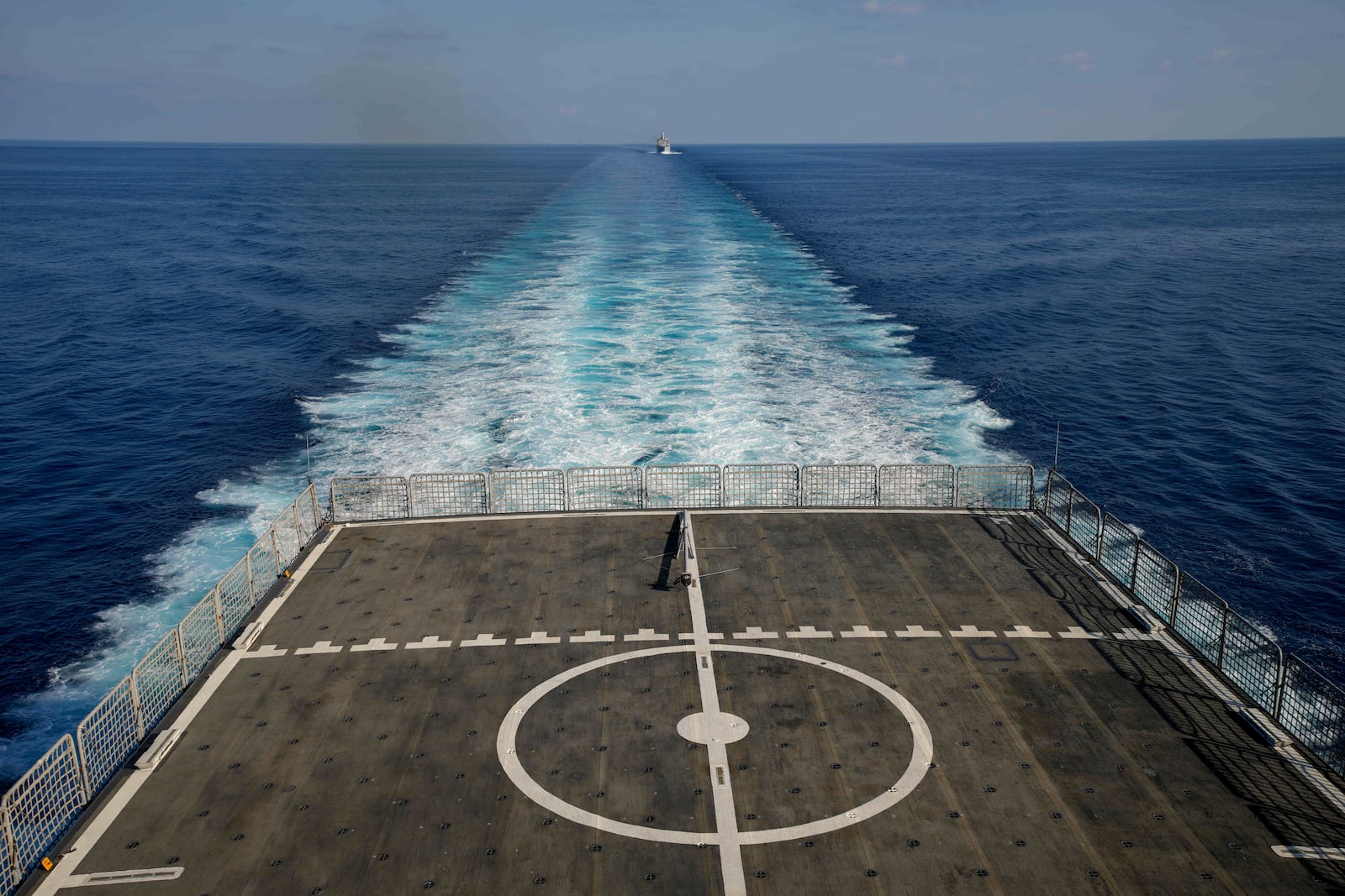 Two Turkish military ships sail in the Mediterranean Sea, heading from the port of Mersin, Turkey, to the port of Beirut to deliver human aid and evacuate Turkish citizens from Lebanon, Wednesday, Oct. 9, 2024. (AP Photo/Emrah Gurel)