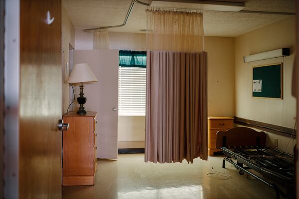 A curtain partitions a patient’s room in the now-closed Gray Health and Rehabilitation nursing home, owned by Rollins. (Melissa Golden/Redux, special to ProPublica)