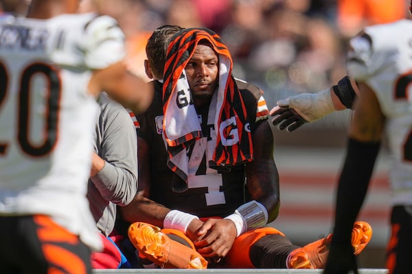 FILE - Cleveland Browns quarterback Deshaun Watson (4) is carted off the field after getting injured in the first half of an NFL football game against the Cincinnati Bengals, Sunday, Oct. 20, 2024, in Cleveland. (AP Photo/Sue Ogrocki, File)