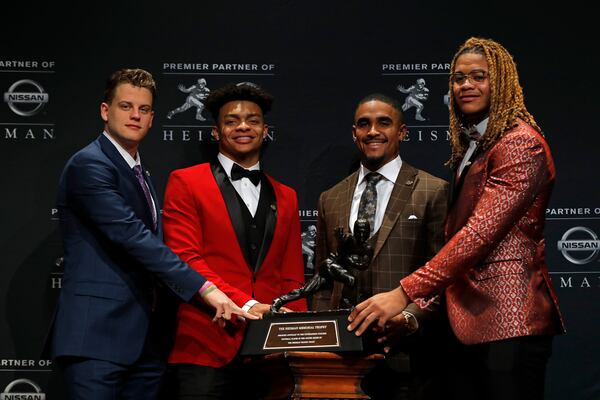 Finalists for the 85th annual Heisman Memorial Trophy, quarterback Joe Burrow of the LSU Tigers, quarterback Justin Fields of the Ohio State Buckeyes, quarterback Jalen Hurts of the Oklahoma Sooners and defensive end Chase Young of the Ohio State Buckeyes. (Photo by Adam Hunger/Getty Images)