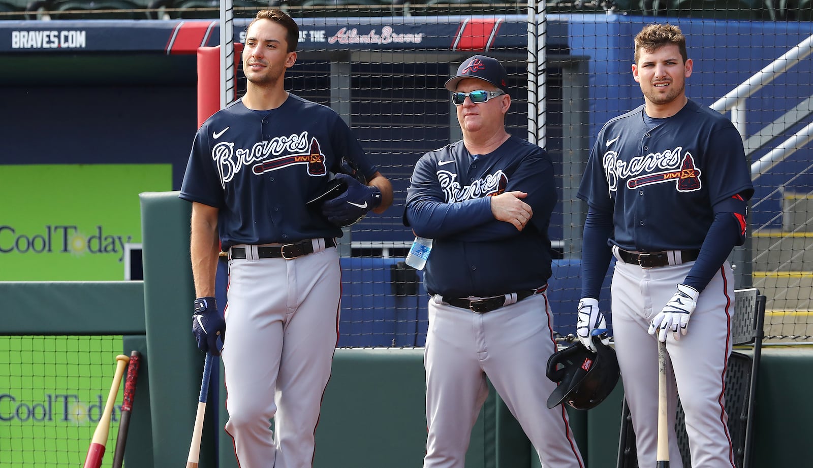 This AJC file photo from 2022 shows Braves hitting coach Kevin Seitzer (center) with first baseman Matt Olson (left) and third baseman Austin Riley.