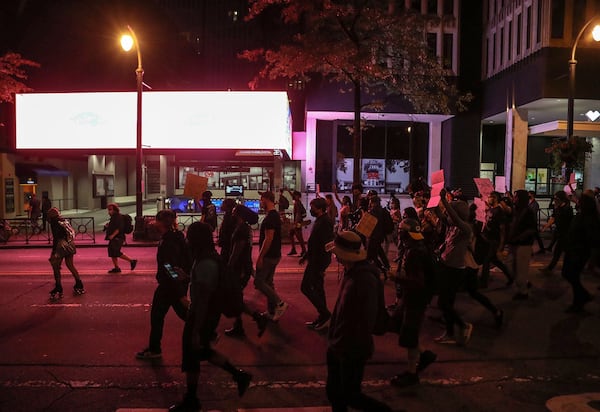 Protesters march down Peachtree Street on Wednesday, Sept. 23, 2020, after the ruling in the death of Breonna Taylor. (Alyssa Pointer / Alyssa.Pointer@ajc.com)