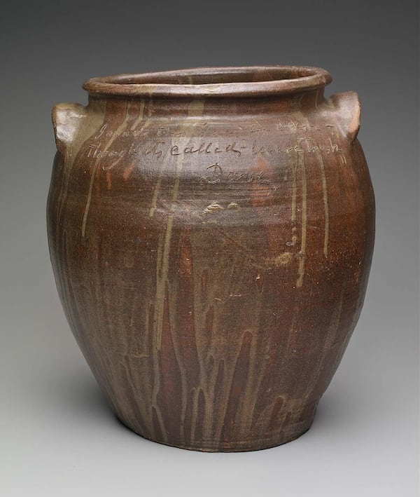 A 1857 storage jar by David Drake. Drake was literate, a crime for enslaved people in the pre-Civil War South. Yet he often inscribed his largest vessels with his name, date, poems and observations.