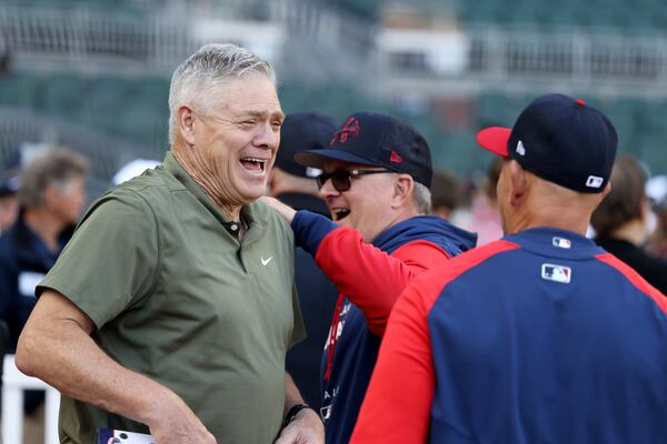 Former Braves player Dale Murphy, left, talks with Atlanta Braves coaches before the Braves’ game against the Chicago Cubs at Truist Park Tuesday, April 26, 2022, in Atlanta.  (Jason Getz / Jason.Getz@ajc.com)