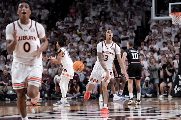 Auburn forward Jahki Howard (3) slams the ball down after a foul call against Auburn drawing a technical foul during the second half of an NCAA college basketball game against Texas A&M on Tuesday, March 4, 2025, in College Station, Texas. (AP Photo/Sam Craft)