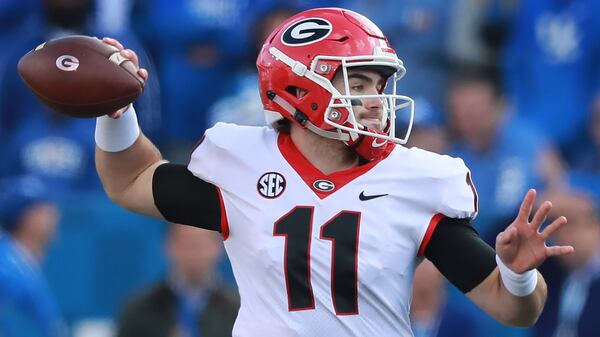 Georgia quarterback Jake Fromm completes a pass against Kentucky during the first half in a NCAA college football game on Saturday, Nov. 3, 2018, in Lexington.  Curtis Compton/ccompton@ajc.com