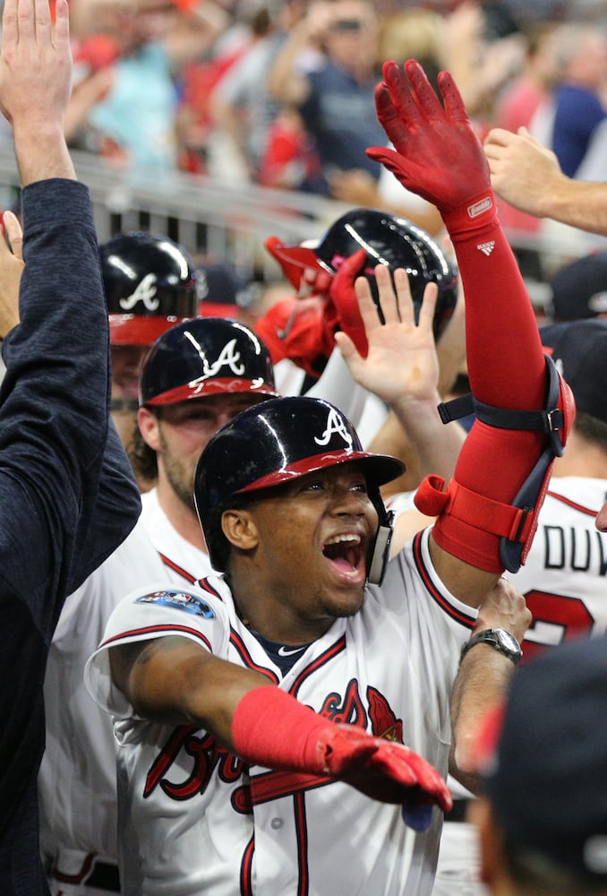 Photos: Acuna, Freeman lead Braves to playoff win over Dodgers