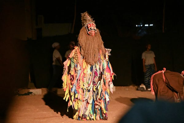 An actor participates in Recreatrales, an international theater festival held in Ouagadougou, Burkina Faso, Monday, Oct. 28, 2024. (AP Photo/Kilaye Bationo)