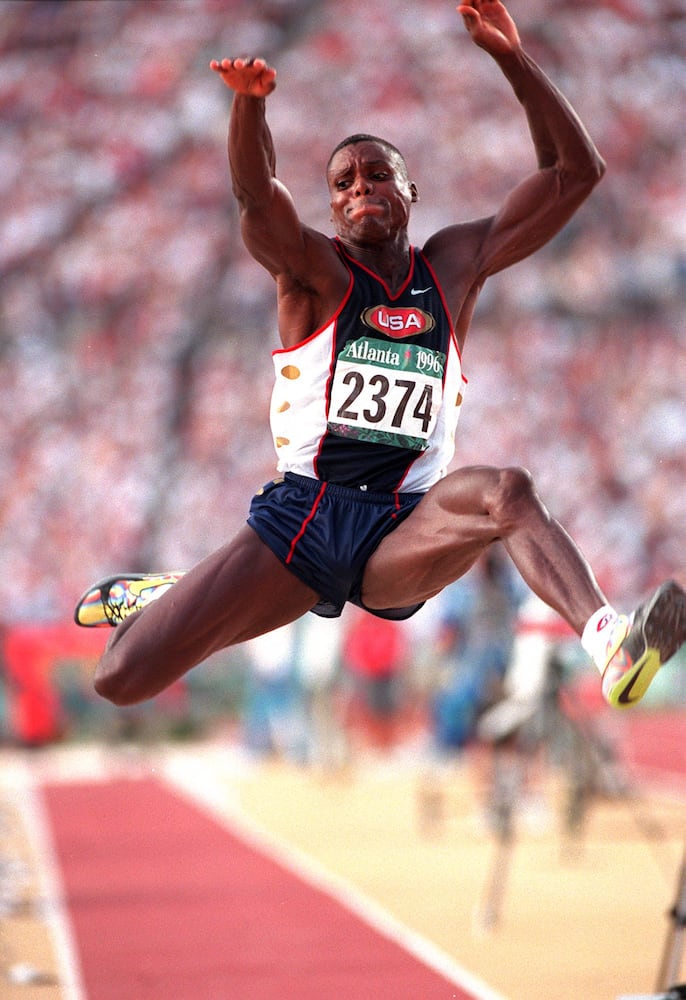 Carl Lewis wins the long jump