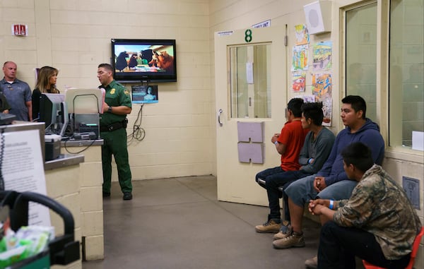 First lady Melania Trump, second from left, visits a processing center of a U.S. Customs and border and protection facility in Tuscan, Ariz., Thursday, June 28, 2018.