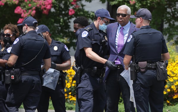 Rep. Hank Johnson (D-GA) is arrested by U.S. Capitol Police during a "Brothers Day of Action on Capitol Hill" protest event outside Hart Senate Office Building in Washington, D.C., on Thursday, July 22, 2021. Advocacy organization Black Voters Matter held the event in support of voting rights and the passage of H.R. 1, the For the People Act, and H.R. 4, the John Lewis Voting Rights Advancement Act by Congress. (Alex Wong/Getty Images/TNS)