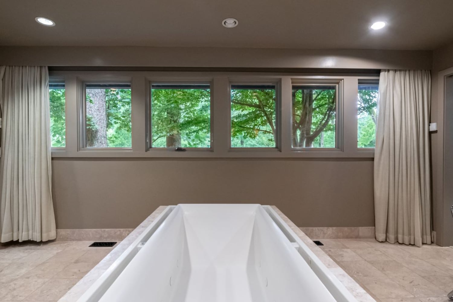 Photos: Indoor pool, infinity tub complete renovated mid-century modern home