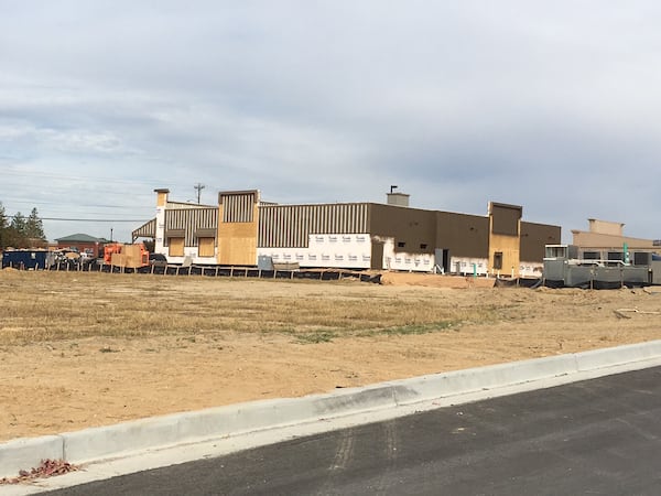 Recent and current construction on Scenic Highway in Snellville and Lawrenceville has included a new Cook Out restaurant, an upcoming Cracker Barrel and a soon-to-open dine-in movie theater. TYLER ESTEP / TYLER.ESTEP@COXINC.COM