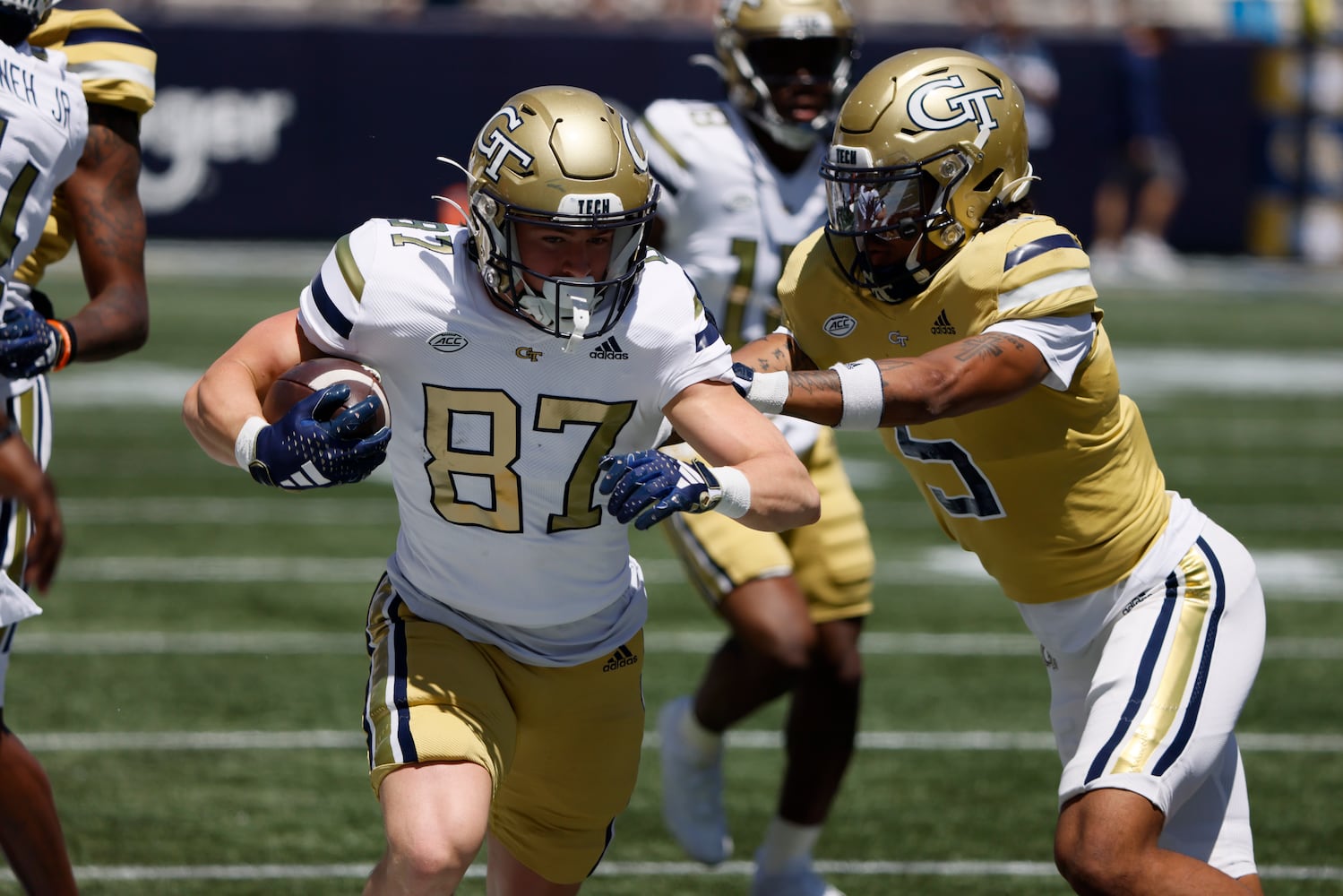 Georgia Tech wide receiver Bailey Stockton (87) extends a catch with Georgia Tech defensive back Clayton Powell-Lee defending during the Spring White and Gold game at Bobby Dodd Stadium at Hyundai Field In Atlanta on Saturday, April 13, 2024.   (Bob Andres for the Atlanta Journal Constitution)