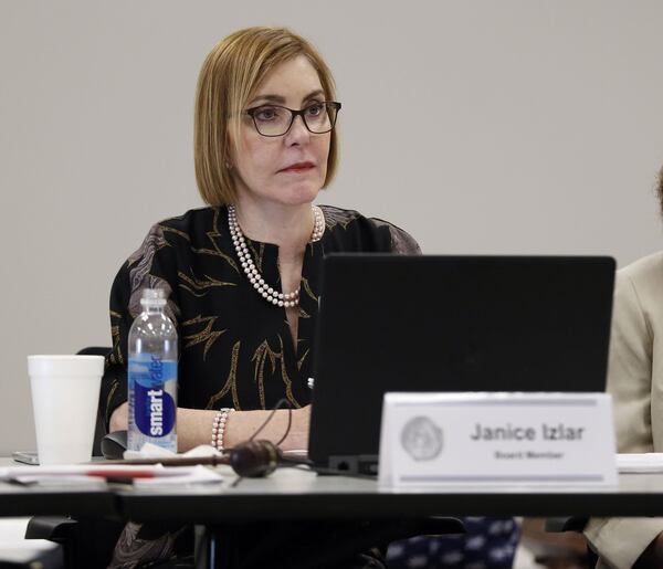 Board President Janice Izlar listens to arguments during a Board of Nursing hearing earlier this month. Izlar says that when the board chooses to keep disciplinary cases involving drug-addicted nurses secret, it takes steps to protect patients and inform employers. BOB ANDRES / BANDRES@AJC.COM