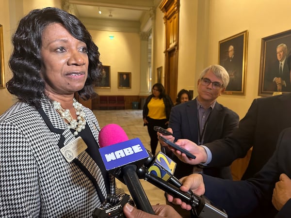 State Rep. Carolyn Hugley, a Democrat from Columbus, speaks to the news media at the Georgia State Capitol on Thursday.