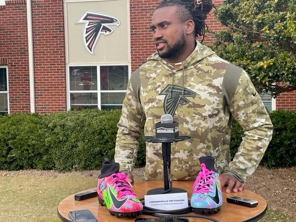 Cordarrelle Patterson with his cleats. (By D. Orlando Ledbetter/dledbetter@ajc.com