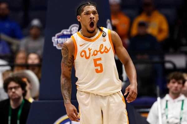 Tennessee guard Zakai Zeigler (5) reacts to play against the Texas during the second half of an NCAA college basketball game in the quarterfinal round of the Southeastern Conference tournament, Friday, March 14, 2025, in Nashville, Tenn. (AP Photo/Wade Payne)