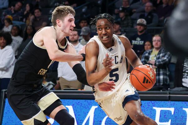 Georgia Tech forward Tafara Gapare (5) drives against Wake Forest forward Andrew Carr (11) during their game at McCamish Pavilion, Tuesday, February 6, 2024, in Atlanta. Wake Forest won 80-51. (Jason Getz / Jason.Getz@ajc.com)