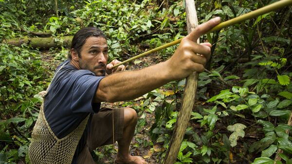 Hazen Audel aims for a guan, a jungle turkey, perched above in the Darien Gap in Panama while filming an episode of âPrimal Survivorâ for the National Geographic Channel. (Stewart Trowell)