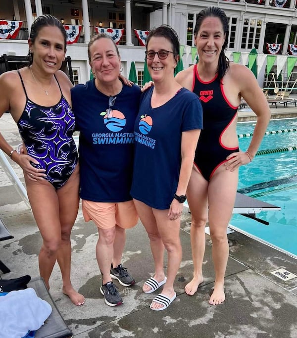 From left: Malena Hankins, Leann Rossi, Marianne Countryman and Britta O’Leary at the Ansley Golf Club pool in Midtown. Hankins, Countryman and O’Leary are members of the Ansley Sharks swim team, and Rossi is a United States Masters Swimming coach.