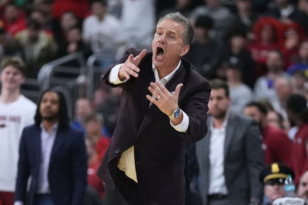 Arkansas head coach John Calipari argues a call during the second half in the first round of the NCAA college basketball tournament, Thursday, March 20, 2025, in Providence, R.I. (AP Photo/Charles Krupa)