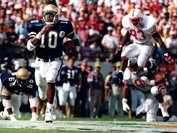 Georgia Tech quarterback Shawn Jones led the Yellow Jackets to the 1991 Florida Citrus Bowl championship over Nebraska, earning a share of the national championship. (AJC file photo by Marlene Karas)