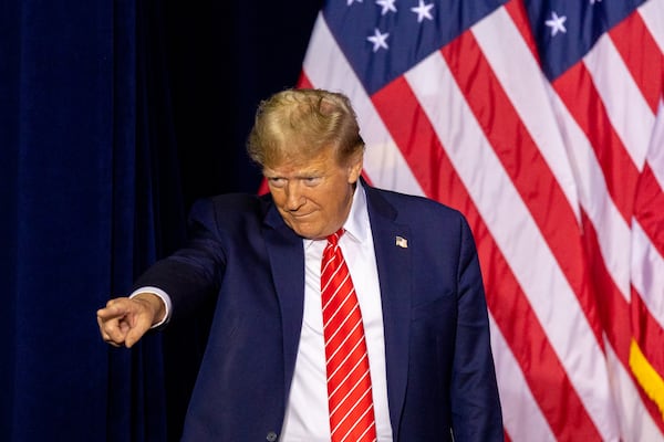 Republican presidential candidate and former president Donald Trump walks on stage at a campaign rally at Forum River Center in Rome on Saturday, March 9, 2024. (Arvin Temkar / arvin.temkar@ajc.com)