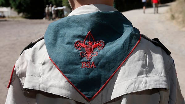 A Boy Scout listens to instruction at camp Maple Dell on July 31, 2015 outside Payson, Utah. The Mormon Church is considering pulling out of its 102 year old relationship with the Boy Scouts after the Boy Scouts changed it's policy on allowing gay leaders in the organization.  Over 99% of the Boy Scout troops in Utah are sponsored by the Mormon Church.