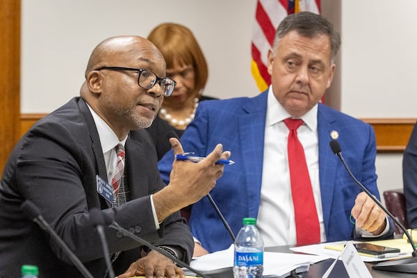 Democratic state Sen. Harold Jones II (left) was elected to be the new Senate minority leader. He is pictured at the Capitol with Republican Rep. Steve Gooch.