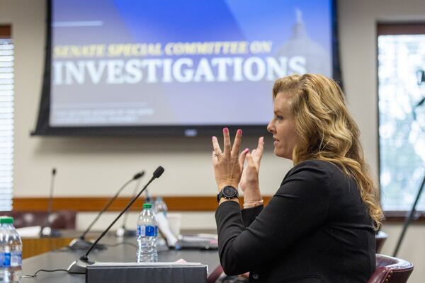  Defense attorney Ashleigh Merchant testifies before the Senate Special Committee on Investigation at the Georgia State Capitol on Wednesday, March 6, 2024. (Steve Schaefer/steve.schaefer@ajc.com)