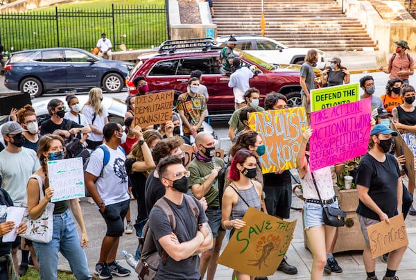 Protesters gather on the steps of Atlanta City Hall on Sunday, Aug 15, 2021 in opposition to a $90 million proposed police training facility. (Jenni Girtman for The Atlanta Journal Constitution)