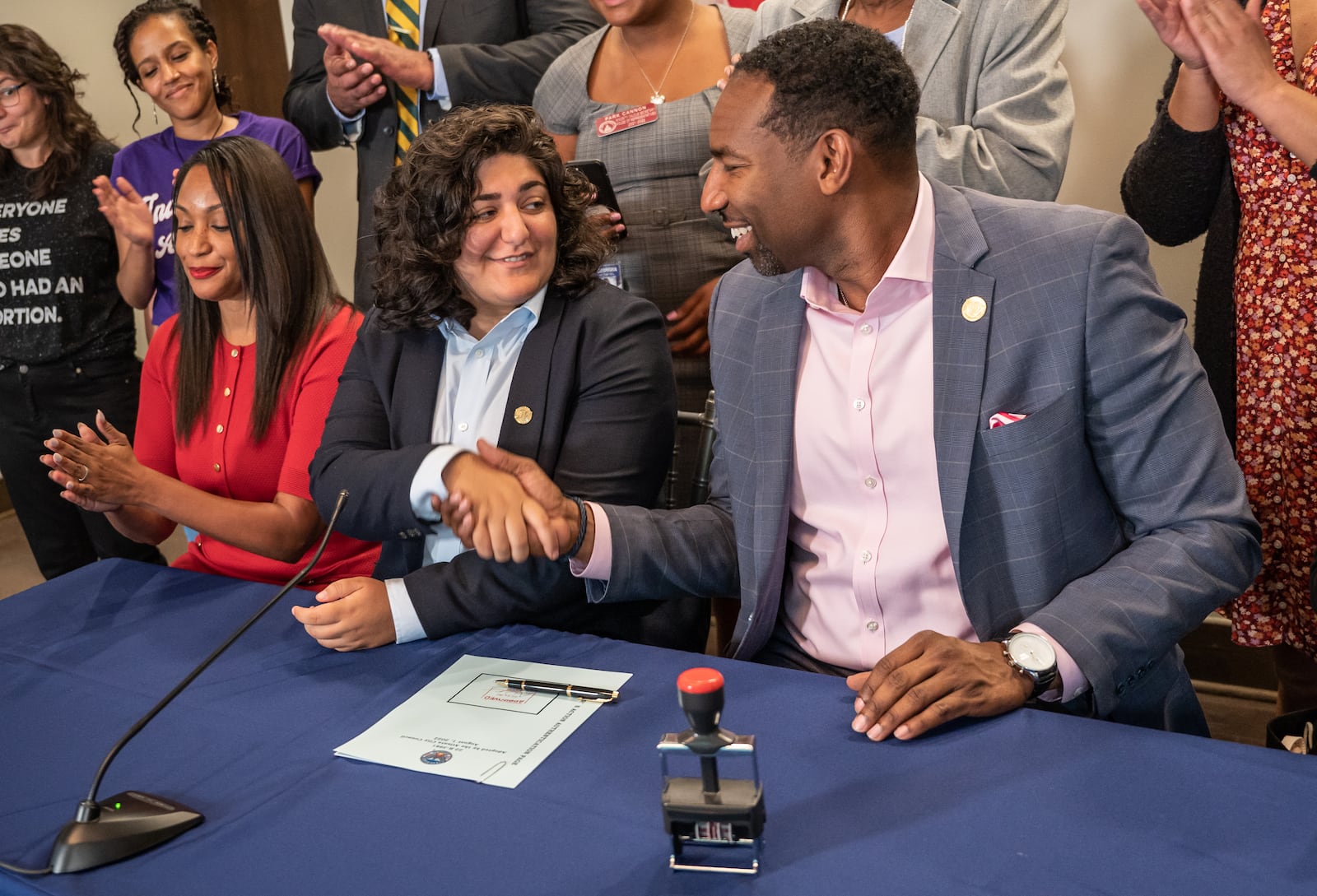 Along with Councilmember Liliana Bakhtiari, Mayor Andre Dickens signed legislation Friday authorizing a $300,000 donation to the National Network of Abortion Funds. (Photo courtesy City of Atlanta)