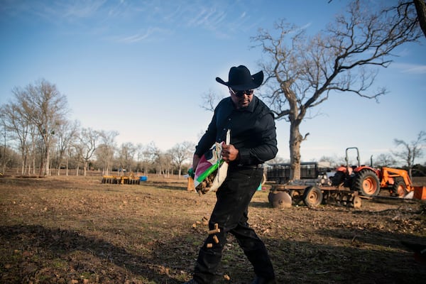 A Black farmer tends to his ranch in Bastrop, Texas.  Some voters interpreted Donald Trump’s “Black jobs” comment as a reference to agricultural, land-based, labor-intensive jobs, hearkening back to the nation’s history of slavery and sharecropping, a fundamentally unequal system for Black farmers. (File photo by Montinique Monroe/The New York Times)