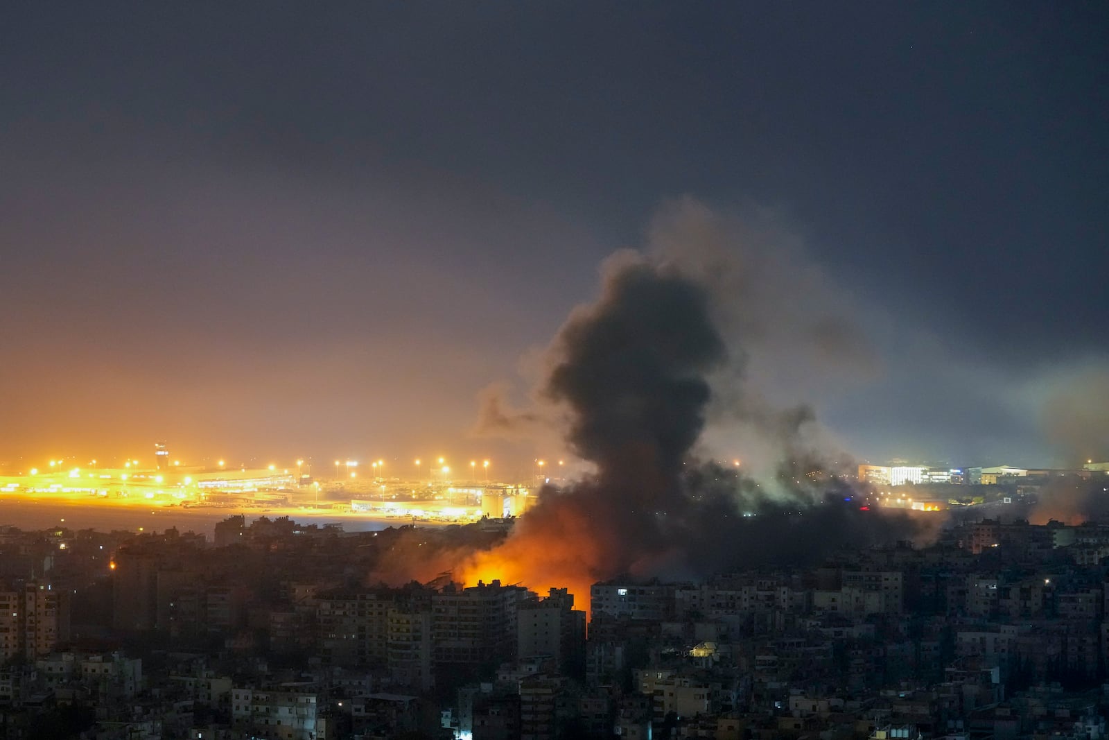 Smoke rises from an Israeli airstrike in Dahiyeh, Beirut, Lebanon, Tuesday, Oct. 22, 2024. (AP Photo/Hassan Ammar)