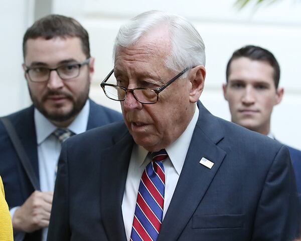 House Majority Leader Steny Hoyer  (D-Md.) leaves a meeting with the House Democratic caucus on September 25.