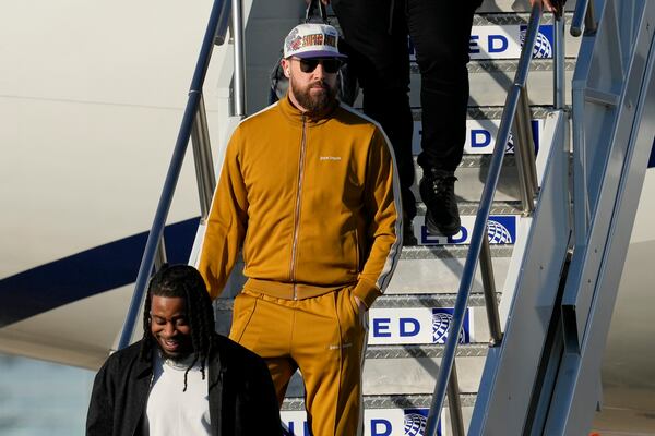 Kansas City Chiefs tight end Travis Kelce arrives at New Orleans international airport, Sunday, Feb. 2, 2025, in Kenner, La. ahead of the NFL Super Bowl 59 football game between the Philadelphia Eagles and the Kansas City Chiefs. (AP Photo/David J. Phillip)