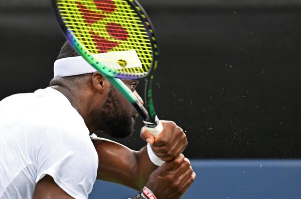 Frances Tiafoe returns the ball to Brandon Nakashima during a men singles quarterfinal match at the 2022 Atlanta Tennis Open at Atlantic Station on Friday, July 29, 2022. (Hyosub Shin / Hyosub.Shin@ajc.com)