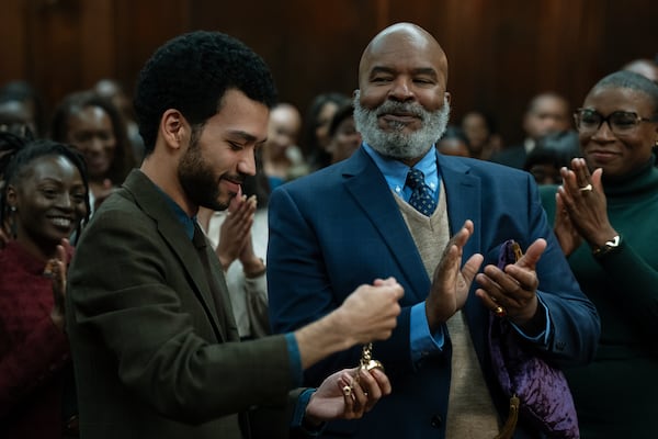 (L to R) Justice Smith as "Aren", David Alan Grier as "Roger" and Aisha Hinds as "Gabbard" in writer/director Kobi Libii's "The American Society of Magical Negroes." (Tobin Yelland / Focus Features)