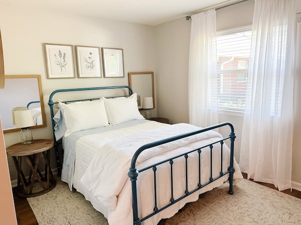 A Nicole Flint bedroom design, which includes a footboard on the bed.