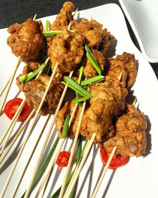 Cricket-coated fried chicken was among the dishes served at the Insectual Dinner Party in Athens. The event was held in conjunction with the three-day Eating Insects Athens conference. CONTRIBUTED BY JOSEPH YOON FOR BROOKLYN BUGS