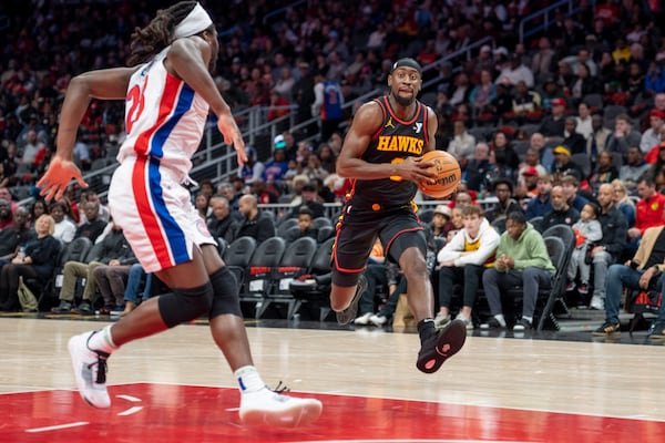 Atlanta Hawks guard Caris LeVert dribbles the ball during the first half of an NBA basketball game against the Detroit Pistons, Sunday, Feb. 23, 2025, in Atlanta. (AP Photo/Erik Rank)