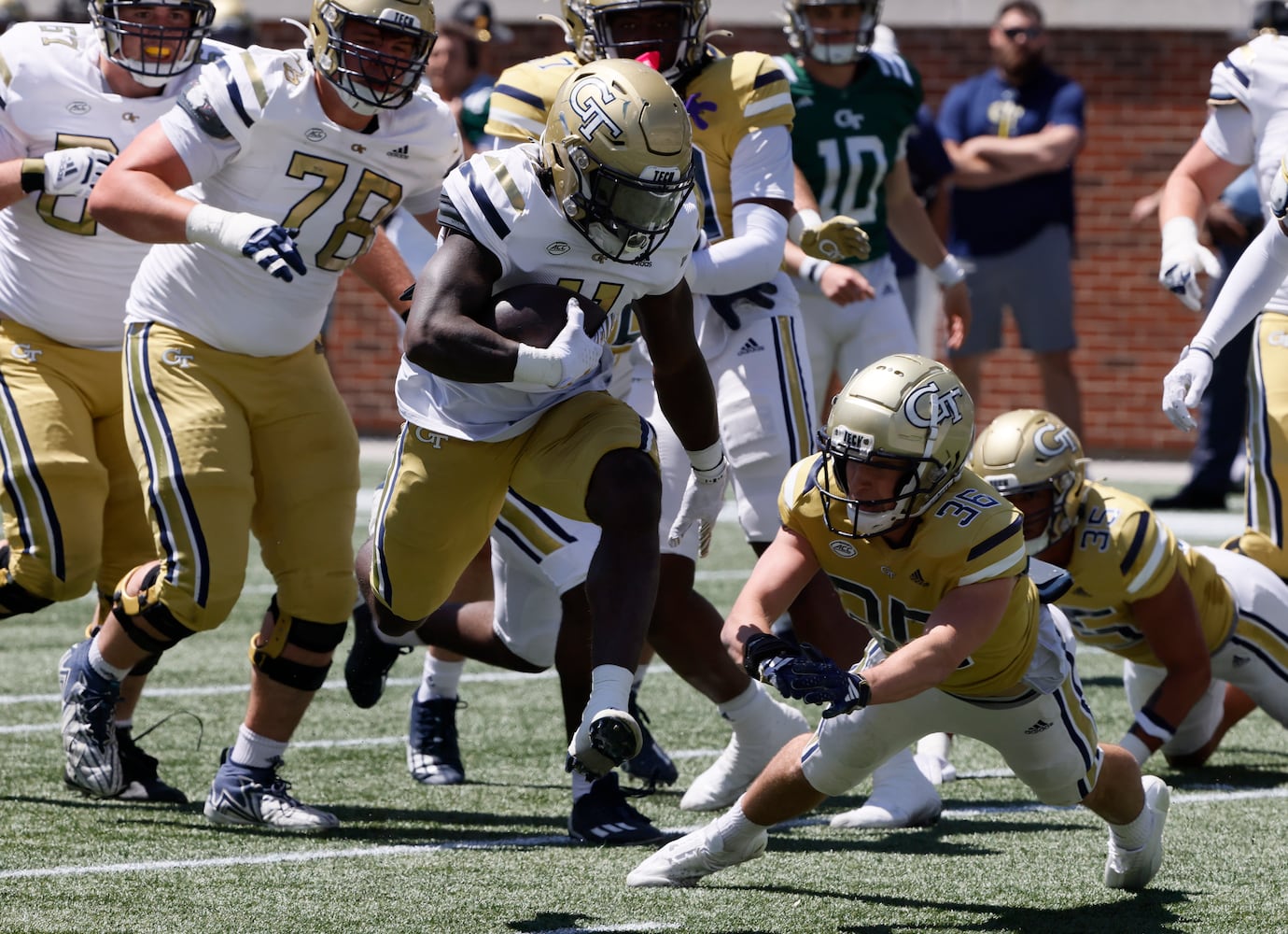 Georgia Tech running back Jamal Haynes (11) scores a touchdown in the first quarter during the Spring White and Gold game at Bobby Dodd Stadium at Hyundai Field In Atlanta on Saturday, April 13, 2024.   (Bob Andres for the Atlanta Journal Constitution)