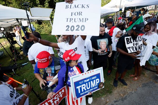 A group called Blacks for Trump show their support to the former president outside of the Fulton County Jail on Thursday, August 24, 2023. (Miguel Martinez /miguel.martinezjimenez@ajc.com)