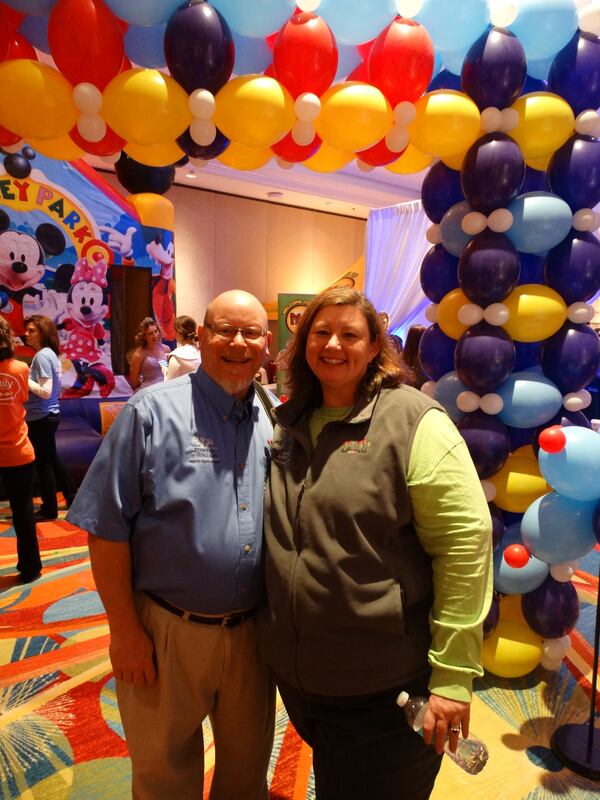 Sean and Holland Muscio of Balloons from Holland have been donating balloon decorations for seven years for Bert's Big Adventure. "I've always been a Disney fan," said Holland. "It's awesome to send them off in style like this." CREDIT: Rodney Ho/ rho@ajc.com