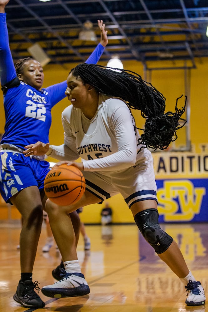 Taylor Christmas (45), center for South Dekalb High School, is guarded by Justice Bennett (22), center for Cass High School, during the South Dekalb vs. Cass girls basketball playoff game on Friday, February 26, 2021, at South Dekalb High School in Decatur, Georgia. South Dekalb defeated Cass 72-46. CHRISTINA MATACOTTA FOR THE ATLANTA JOURNAL-CONSTITUTION