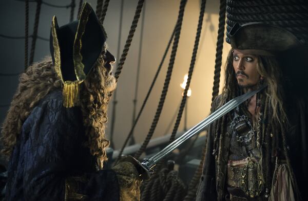 Geoffrey Rush and Johnny Depp co-star in the sequel “Pirates of the Caribbean: Dead Men Tell No Tales,” opening May 26. CONTRIBUTED BY WALT DISNEY PICTURES