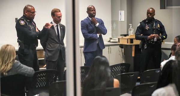 From left, Georgia State University police Chief Anthony Coleman, Chief Operating Officer Jared Abramson, President M. Brian Blake and Atlanta police Captain Christian Hunt address students at a residence hall on Monday, Oct. 30, 2023, after a weekend shooting. (John Spink / John.Spink@ajc.com)

